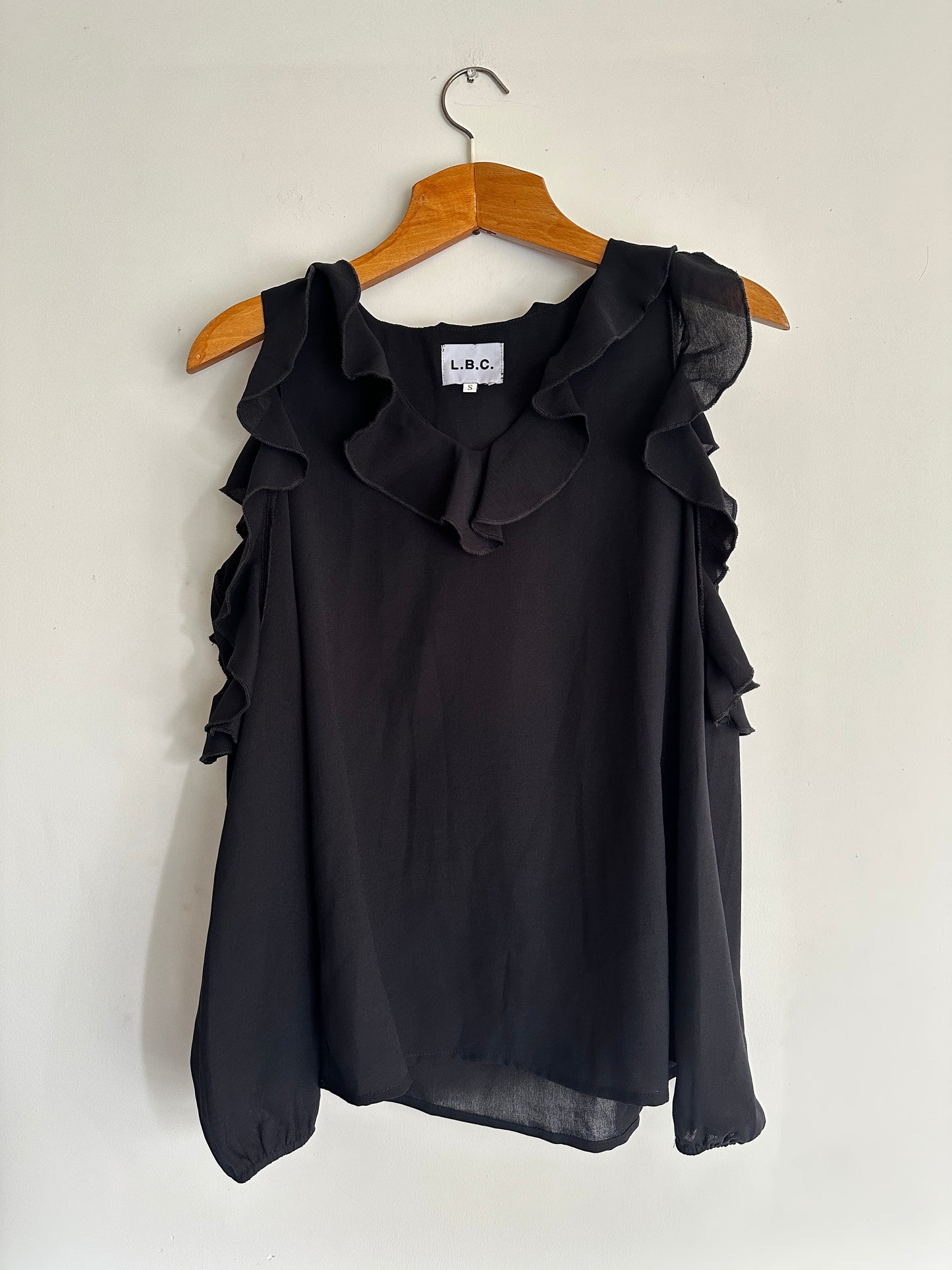 Blusa con pliegues