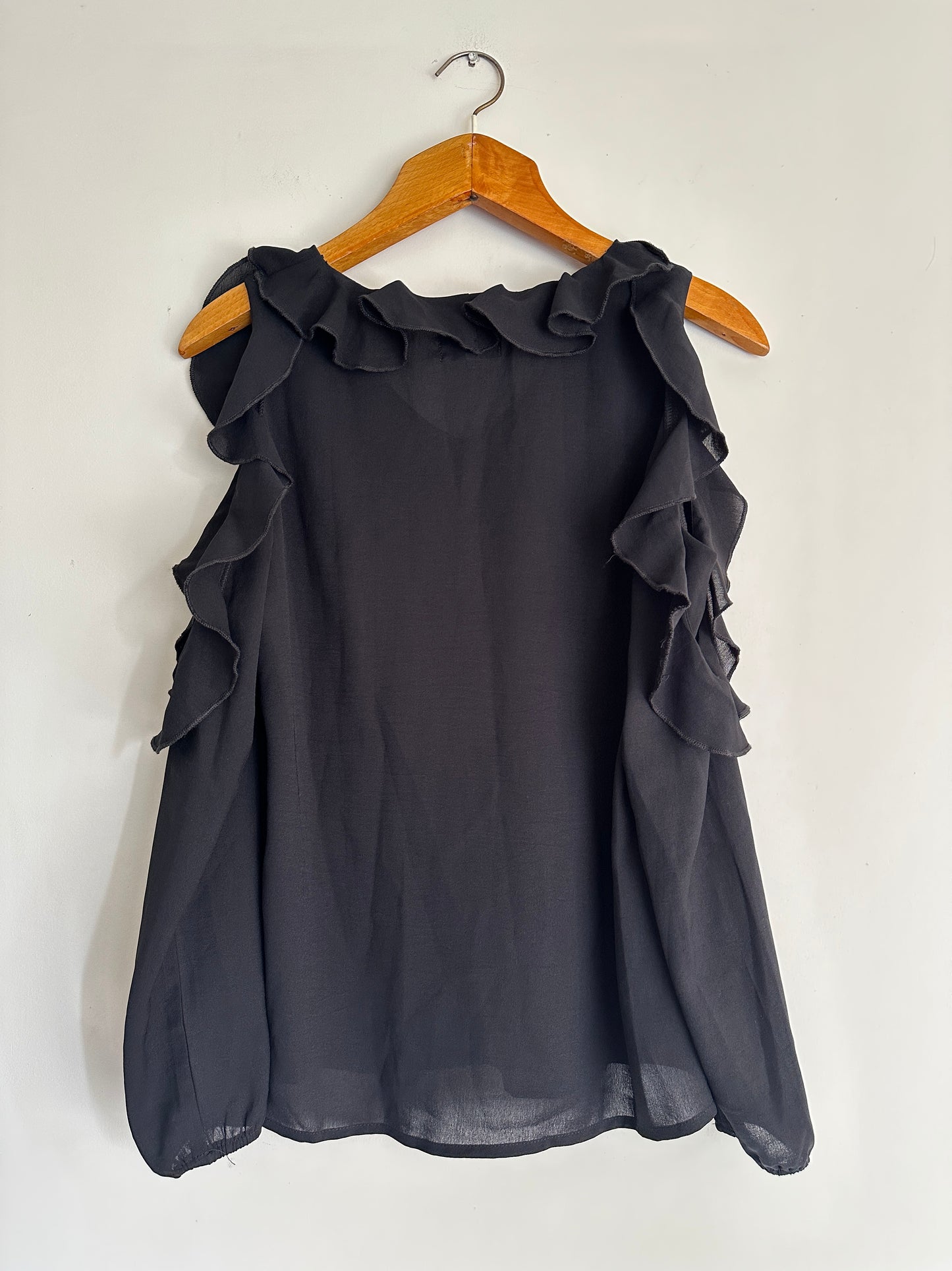 Blusa con pliegues