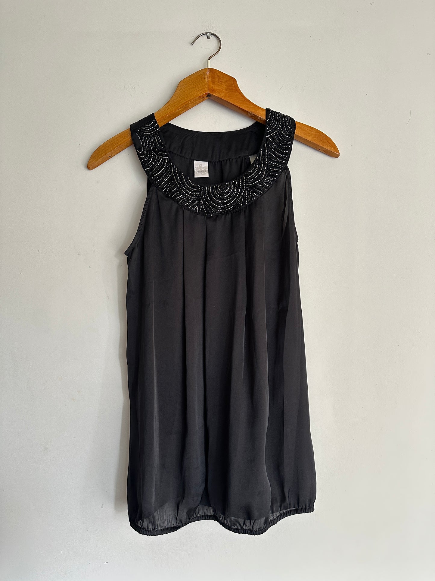 Blusa de seda negra